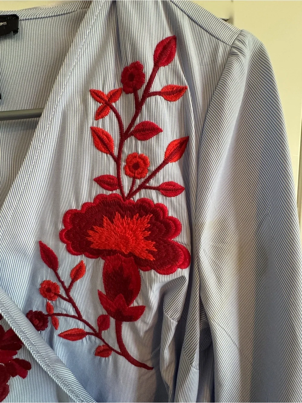 INC International Concepts Pale Blue Wrap Blouse with Red Floral Embroidery